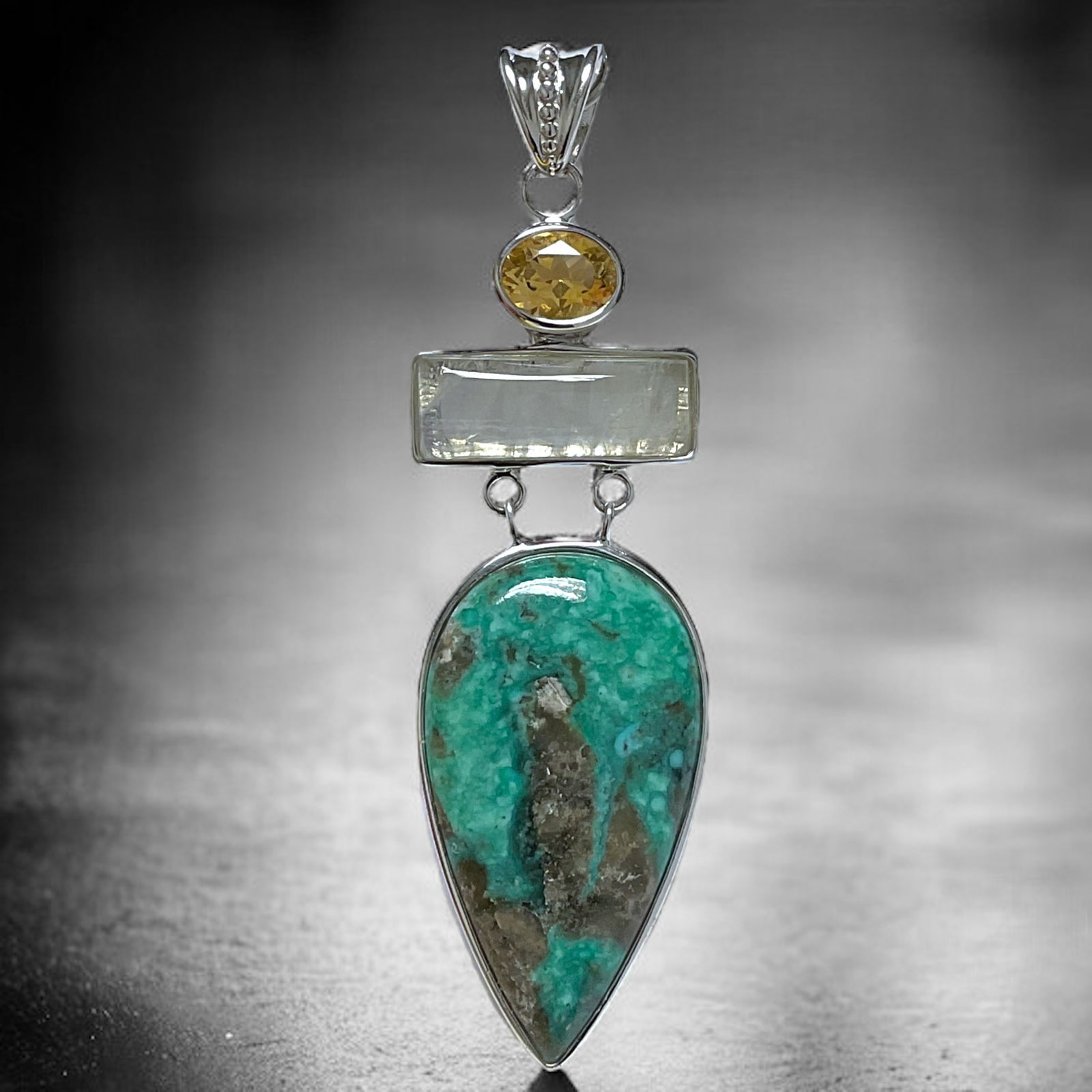 An array of Turquoise, Moonstone, & Citrine provide a magnificant style on this Sterling Silver (1 of 1)