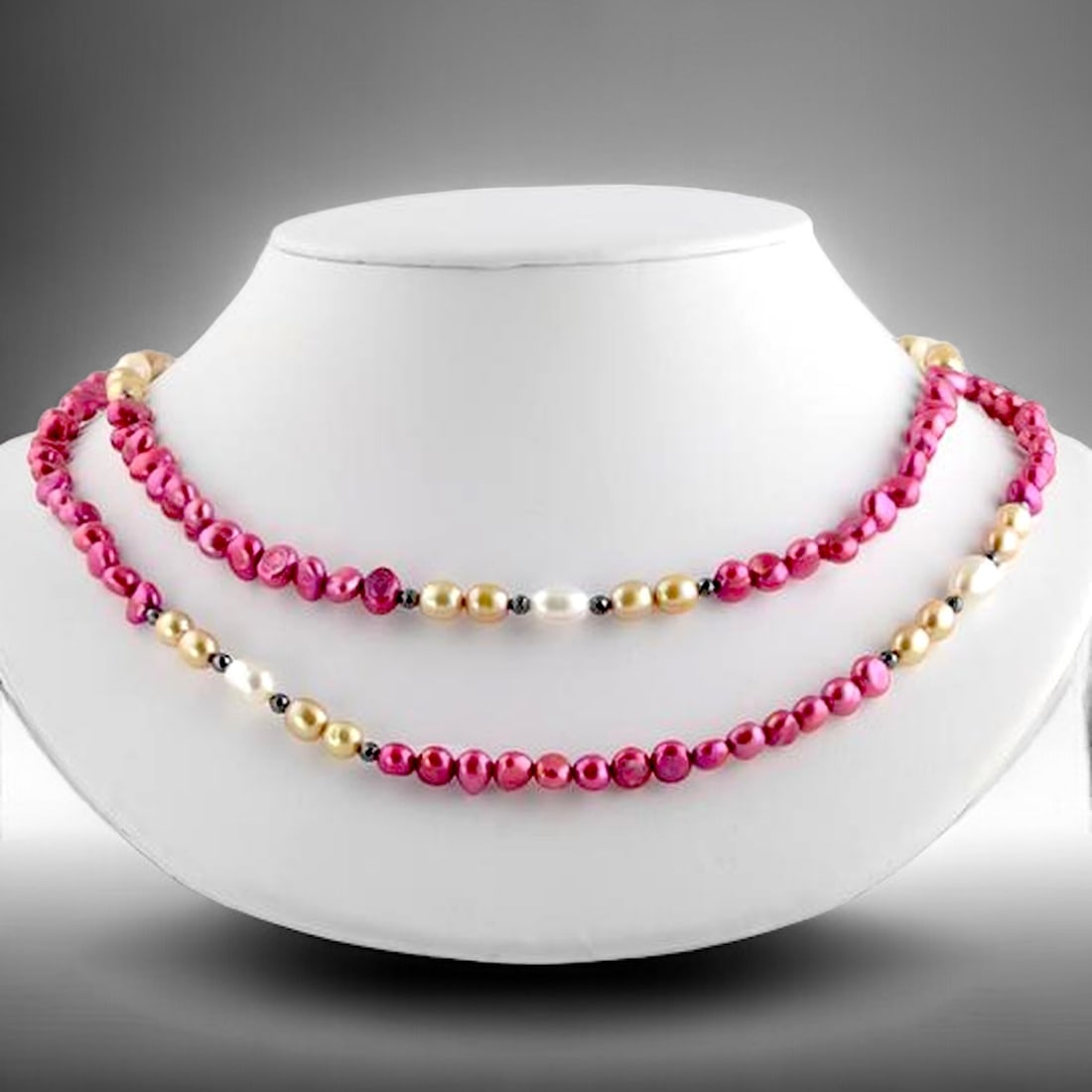 Multi-color Freshwater Pearl 40" Necklace with Sterling Silver clasp and Hematite: Lobster Clasp Product Details Item: Necklace Metal: Sterling Silver Gemstone: Pink, White, & Champagne Freshwater Pearls & Hematite Approximate Measurements: 40" Ring Size: Not Applicable Chain