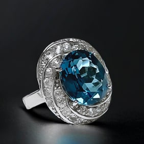 Enchanting 5.85 cttw London Blue Topaz Ring in Sterling Silver with White Topaz