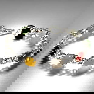 Magnificent array of Gemstones crafted in a 7.75" Sterling Silver Bracelet: Product Details Item: Bracelet Metal: Sterling Silver Gemstone: Multiple Gemstone Approximate Measurements: 7.75" X Width: 8 mm Ring Size: Not Applicable Chain Length: Not Applicable Chain