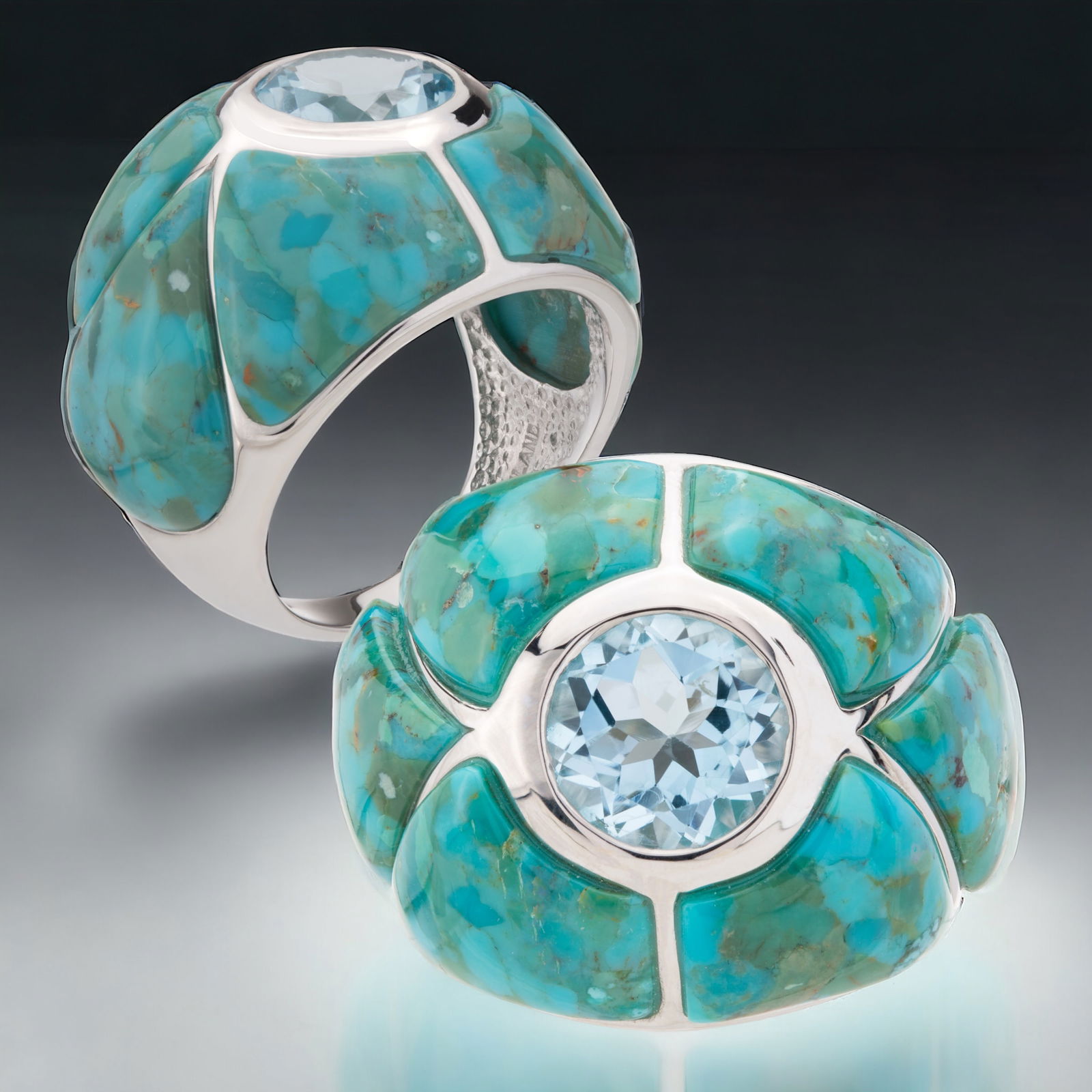 Captivating Freeform Turquoise & Sky Blue Topaz Sterling Silver Ring - Size 5: Compressed, Stabilized and Coated Turquoise: Two freeform shaped 16 mm X 11mm cabochons and four freeform shaped 11 mm X 11mm cabochons Sky Blue Topaz: One round modified-brilliant cut 9 mm stone Prod