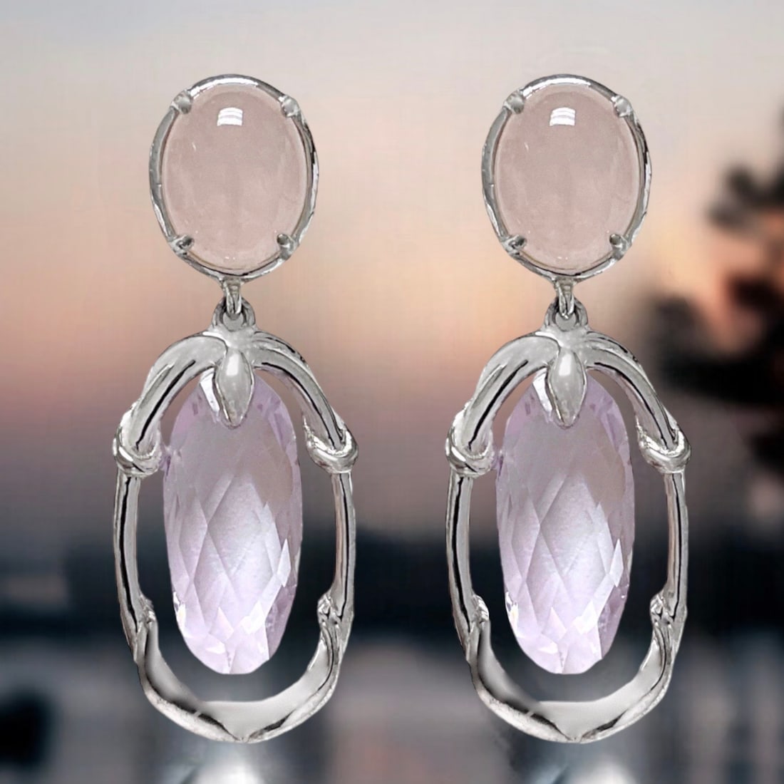 Enchanting Amethyst & Morganite Sterling Silver Earrings: Product Details Item: Earrings Metal: Sterling Silver Gemstone: Amethyst & Morganite Approximate Measurements: 38.8 mm X 13.9 mm Ring Size: Not Applicable Chain Length: Not Applicable