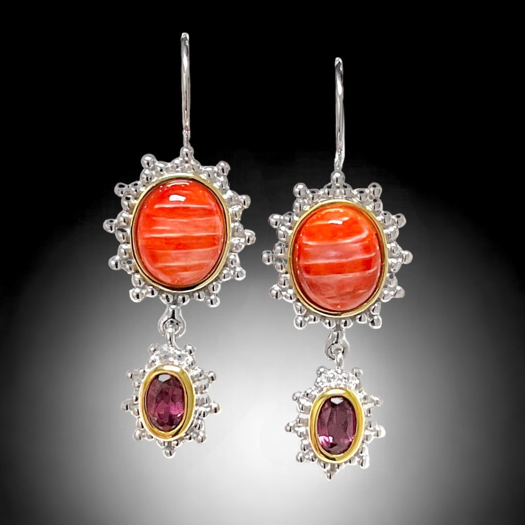 Adorn your ears with the exquisite beauty of these sterling silver earrings adorned with Spiny: Product Details Item: Earrings Metal: Sterling Silver Gemstone: Spiny Oyster & Rhodolite Garnet Approximate Measurements: 40.4 mm X 14.4 mm Ring Size: Not Applicable Chain Length: Not Applic