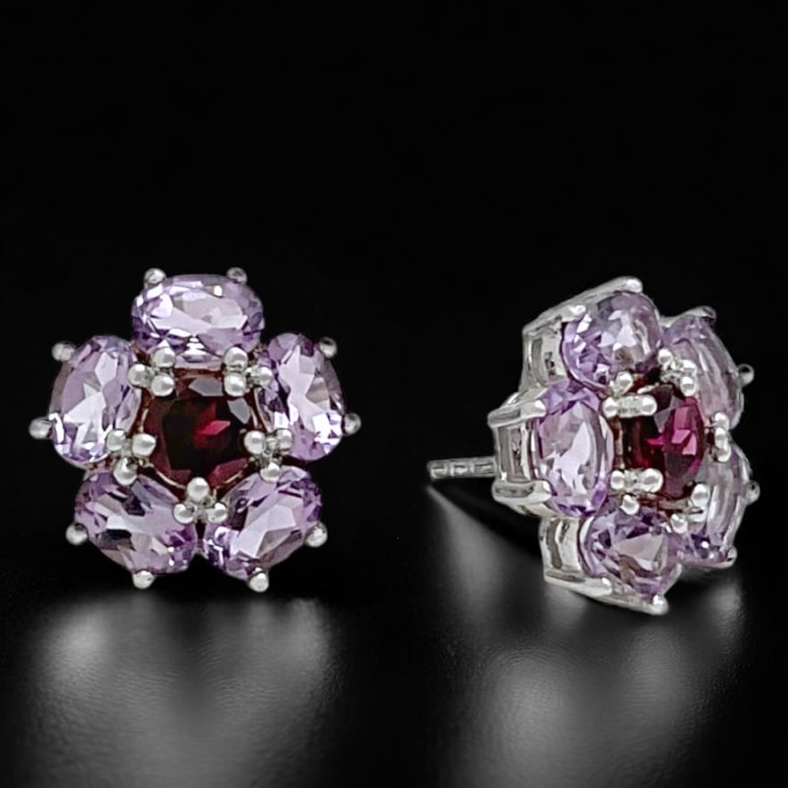 Enchanting Amethyst & Garnet Sterling Silver Earrings: Product Details Item: Earrings Metal: Sterling Silver Gemstone: Amethyst & Garnet Approximate Measurements: Width: 14.6 mm Ring Size: Not Applicable Chain Length: Not Applicable Chai