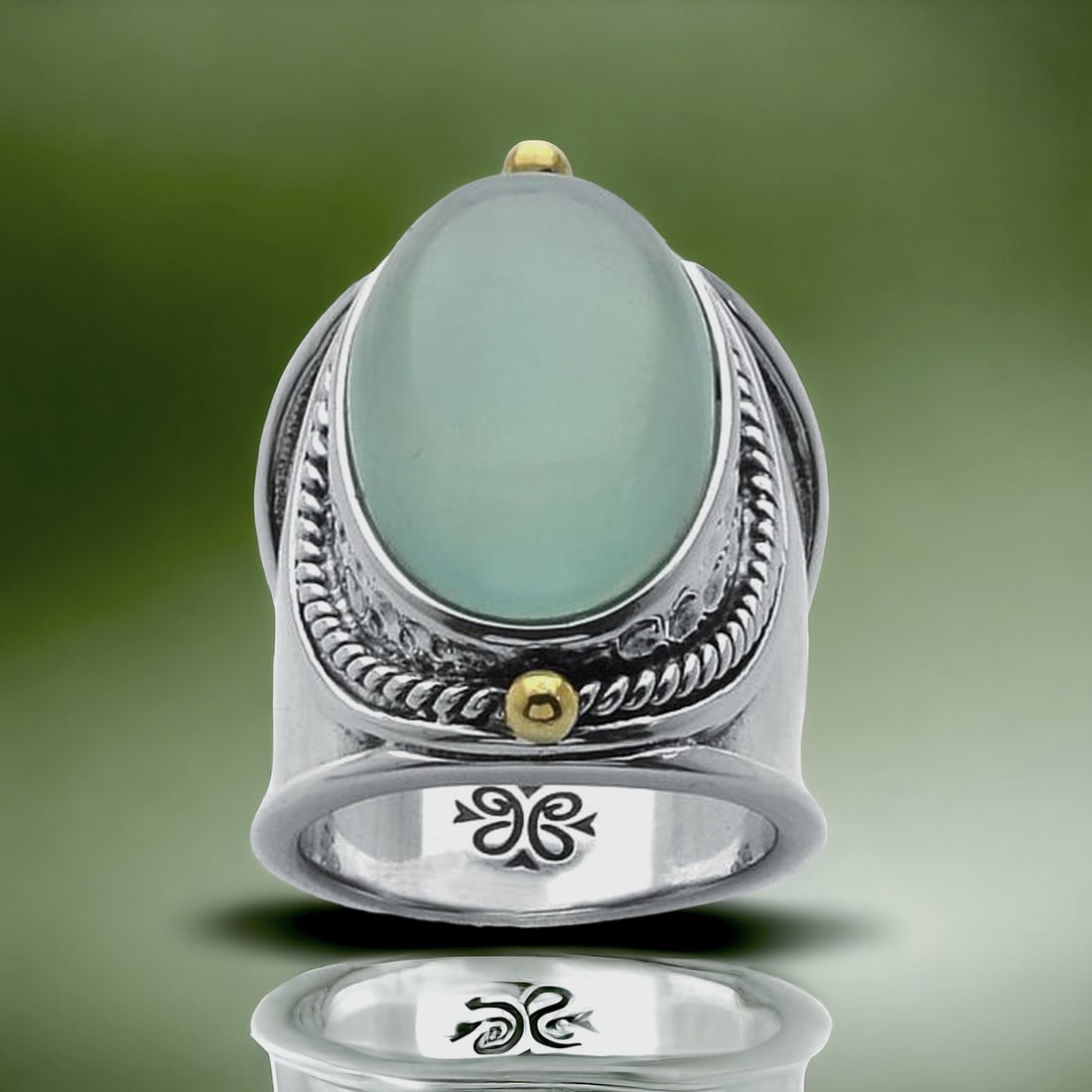 Expertly crafted Seaform Chalcedony Ring set in Sterling Silver - Size 6: Product Details Item: Ring Metal: Sterling Silver Gemstone: Aqua Chalcedony Approximate Measurements: Width: 28.4 mm Ring Size: 6 Chain Length: Not Applicable Chain Metal: Not Applica
