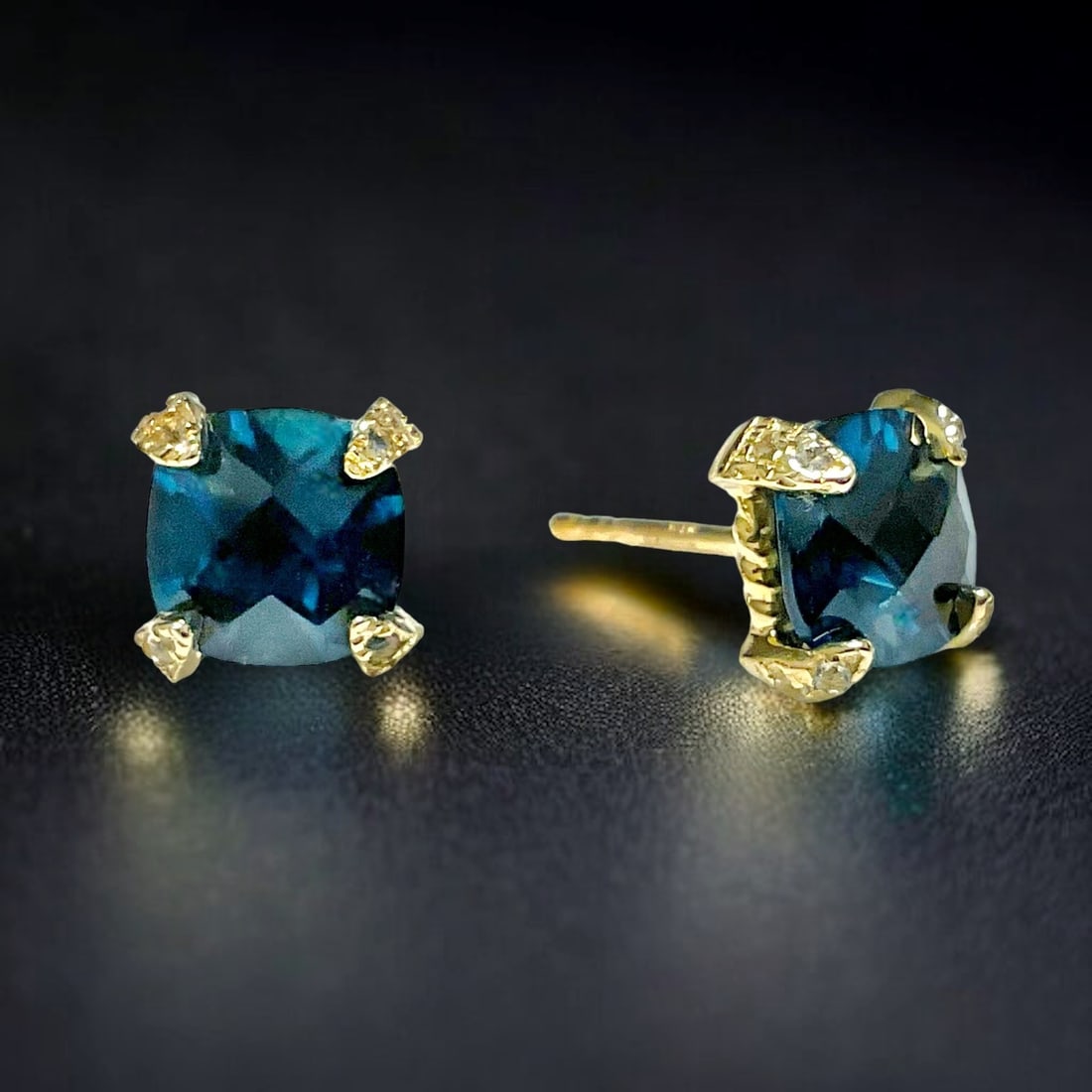 14K Gold London Blue Topaz Studs: Product Details Item: Earrings Metal: 14K Gold Gemstone: Blue Topaz Approximate Measurements: Width: 7.5 mm Ring Size: Not Applicable Chain Length: Not Applicable Chain Metal: Not Applic