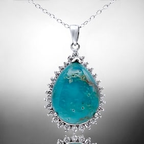 Heavenly Pear Shaped Turquoise Pendant crafted in Sterling Silver with shimmering Simulated Diamond
