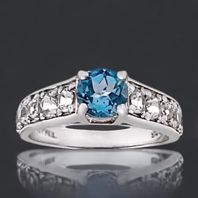 Swiss Blue Topaz Sterling Silver Ring, beautifully complemented by sparkling White Topaz accents -