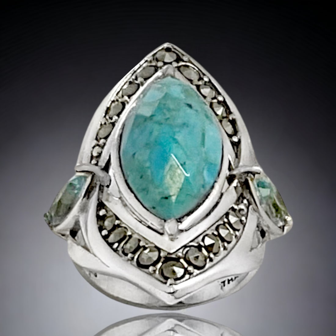Genuine Turquoise Sterling Silver Ring with Sky Blue Topaz & Marcasite Accents - Size 8: Product Details Item: Ring Metal: Sterling Silver Gemstone: TQ/BT/Marcasite Approximate Measurements: Width: 35.2 mm Ring Size: 8 Chain Length: Not Applicable Chain Metal: Not Applica