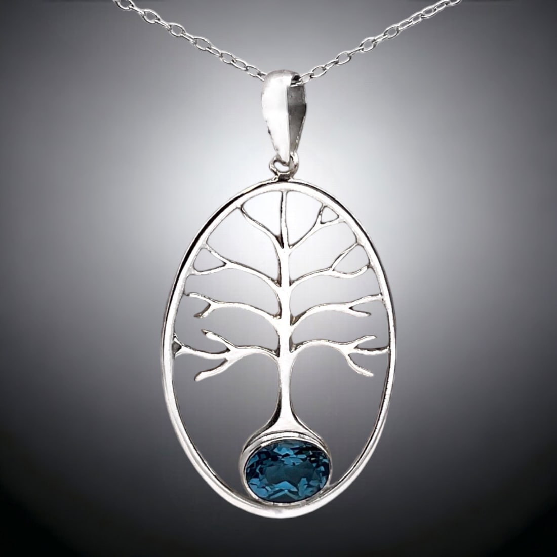 Enchanting Tree of Life Sterling Silver Pendant with Blue Topaz and 18" Chain (1 of 1)
