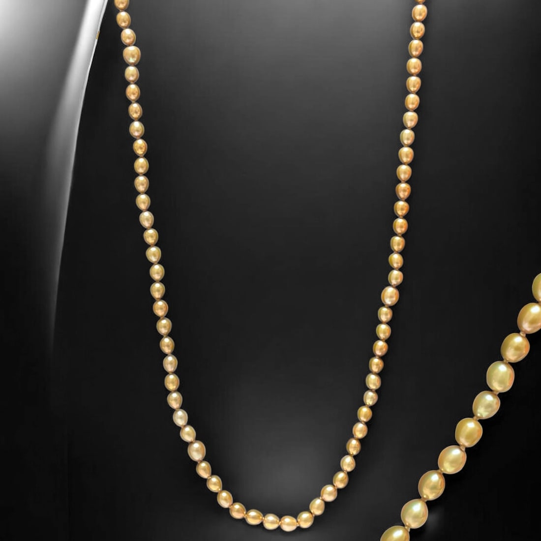 A timeless Champagne Pearl Necklace at 39.5" in length this necklace will truly dazzle everyone you (1 of 1)