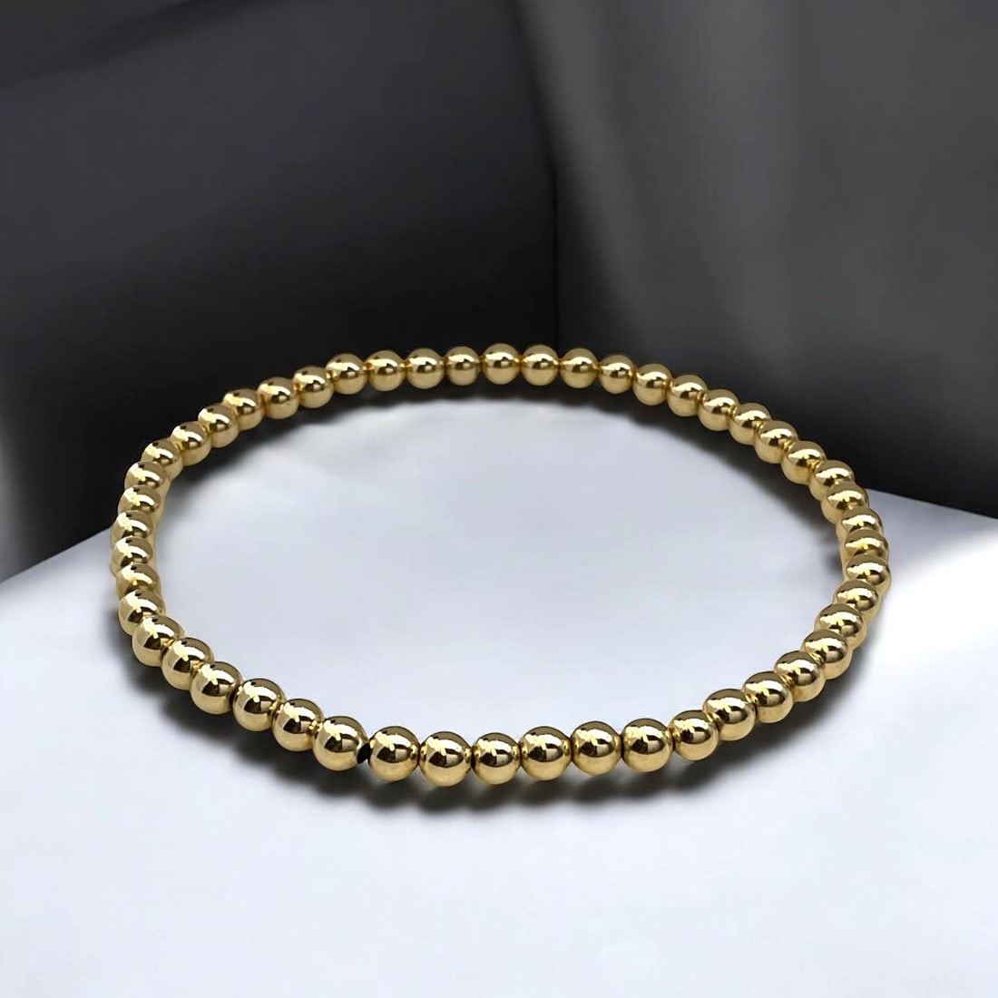 14K Gold 7.5" Friendship 4 mm Stretch Bracelet: Product Details Item: Bracelet Metal: 14K Gold Gemstone: None Approximate Measurements: 4 mm Bead Ring Size: Not Applicable Chain Length: Not Applicable Chain Metal: Not Applicable