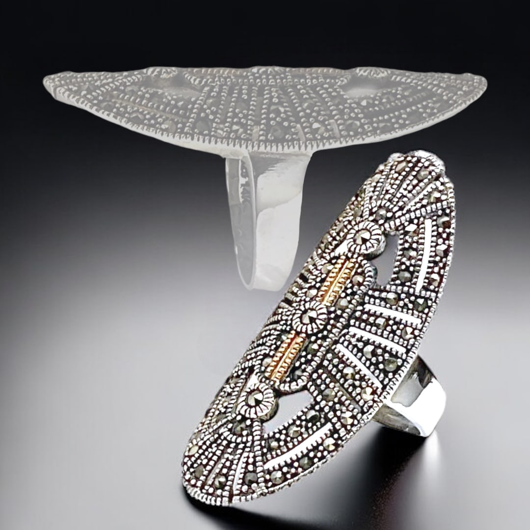 Striking 14K Gold & Sterling Silver Marcasite Elongated Shield Statement Ring – Size 7: Product Details Item: Ring Metal: 14K Gold & Sterling Silver Gemstone: Marcasite Approximate Measurements: Width: 41.7 mm Ring Size: 7 Chain Length: Not Applicable Chain Metal: Not Appli