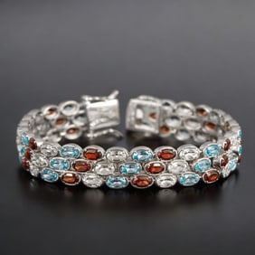 Delightful Blue Topaz, Garnet, & White Topaz Sterling Silver Bracelet - 6.75"