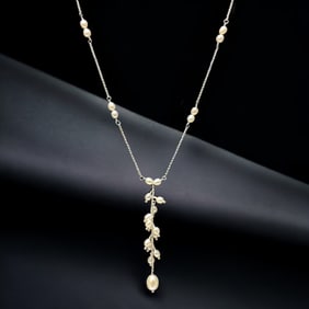 Timeless Sterling Silver Pearl Necklace with numerous Pearls creating a stunning display