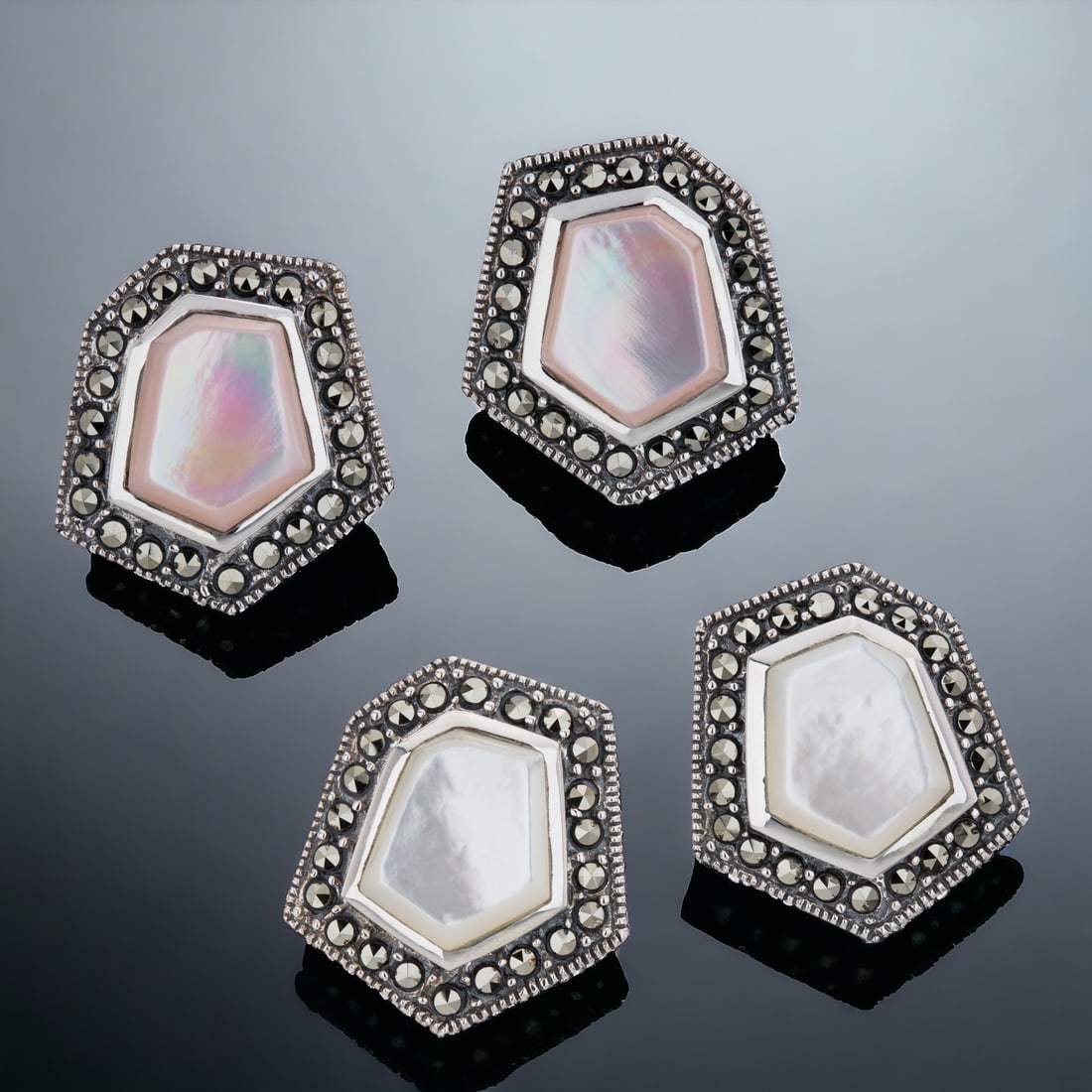 Set of 2 Pink & White Mother-of-Pearl Sterling Silver Earrings with Marcasite Accents: Product Details Item: Earrings Metal: Sterling Silver Gemstone: Pink&White MOP & Marcasite Approximate Measurements: 18.2 mm X 16.7 mm Ring Size: Not Applicable Chain Length: Not Applicable