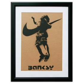 Cardboard Art Attributed to Banksy Featuring a Kid Jumping with Nike Swoosh