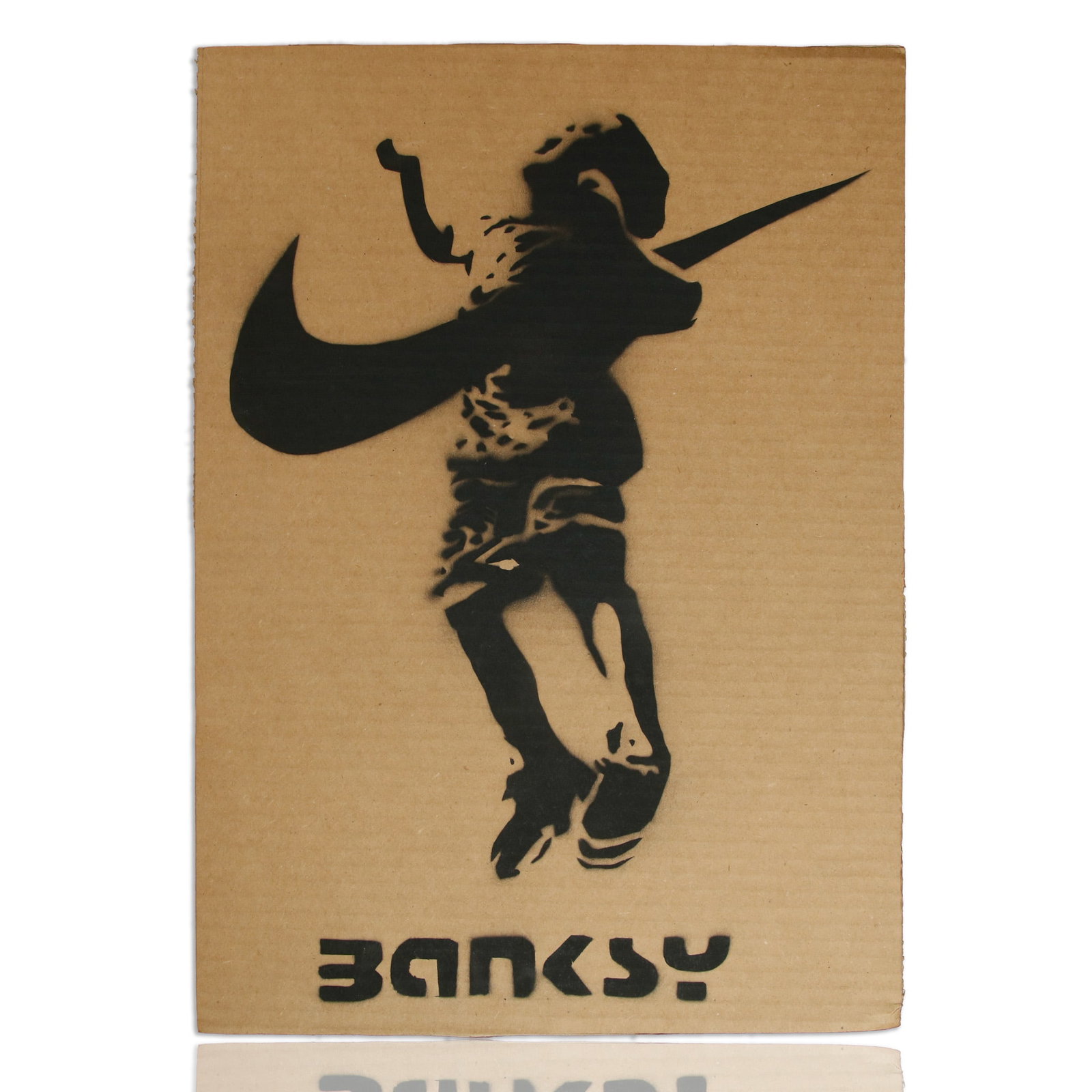 Cardboard Art Attributed to Banksy Featuring a Kid Jumping with Nike Swoosh: Cardboard Art Attributed to Banksy Featuring a Kid Jumping with Nike Swoosh. Dimensions: 19 x 13.5 inches (unframed). Medium: Mixed media on cardboard. Signature: Signed "BANKSY" at the bottom of the 