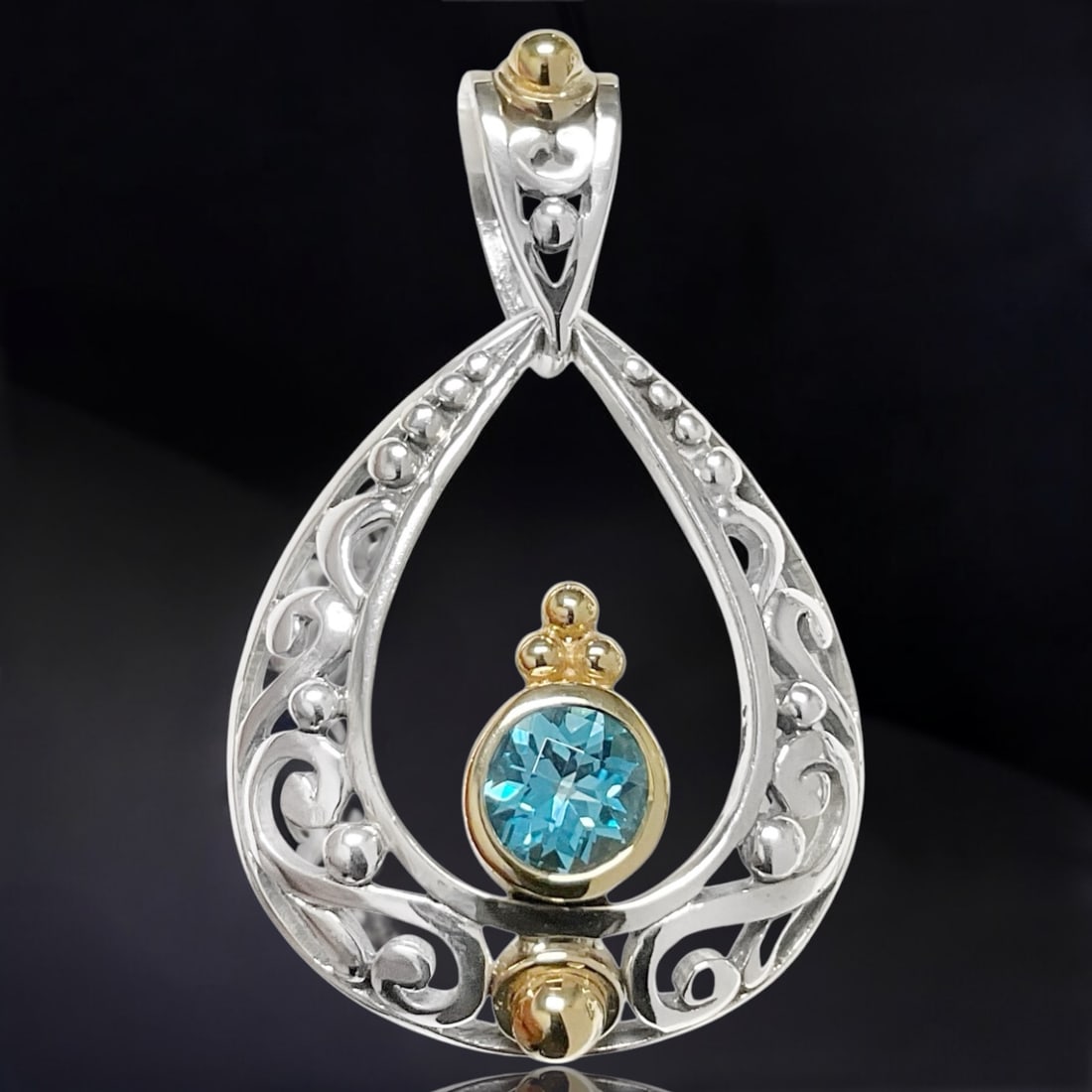 Regal 14K Gold & Sterling Silver Blue Topaz Pendant with exquisite design (1 of 1)