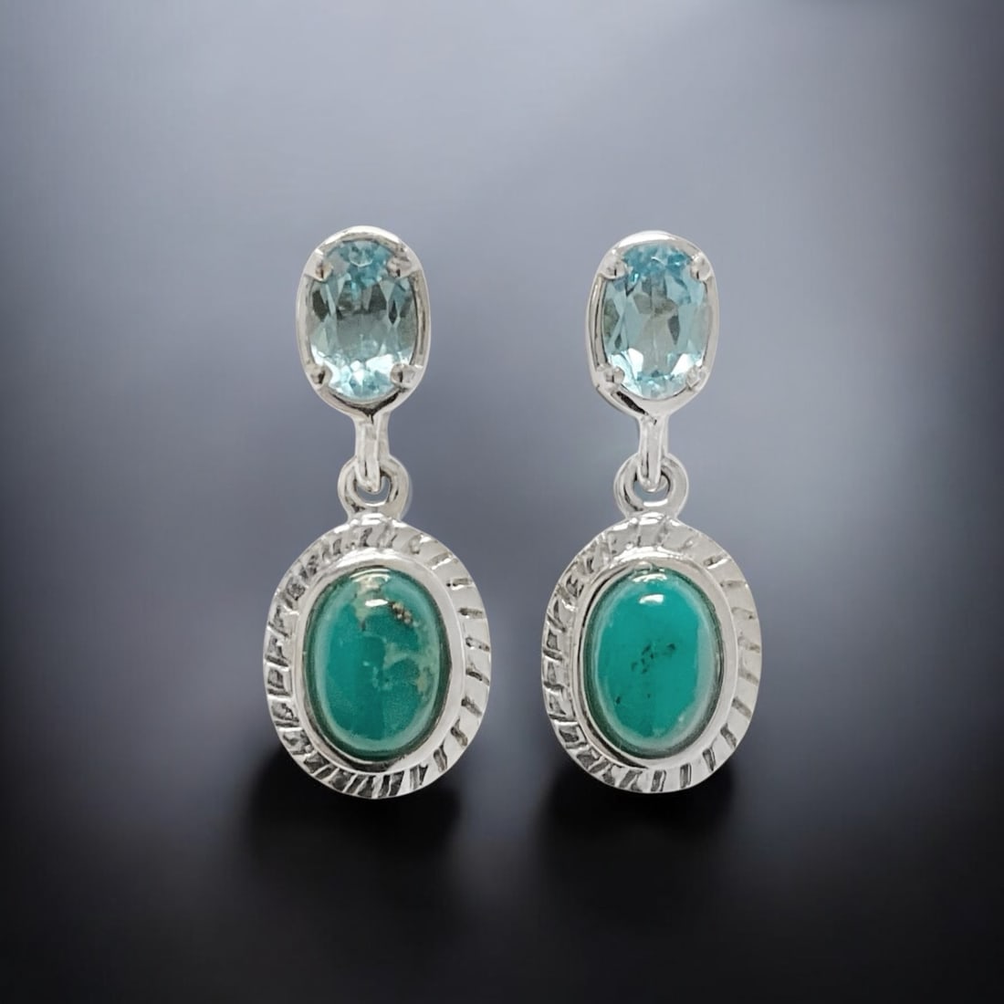 Southwest Campo Frio Turquoise & Swiss Blue Topaz Sterling Silver Earrings: Product Details Item: Earrings Metal: Sterling Silver Gemstone: Campo Frio Turquoise & Swiss Blue Topaz Approximate Measurements: 22.5 mm X 8.8 mm Ring Size: Not Applicable Chain Length: Not Ap