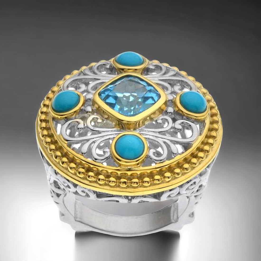 Gold over Sterling Silver Ring with Turquoise & Swiss Blue Topaz - Size 7: Product Details Item: Ring Metal: Sterling Silver Gemstone: Blue Topaz & Turquoise Approximate Measurements: Width: 28.3mm Ring Size: 7 Chain Length: Not Applicable Chain Metal: Not Ap