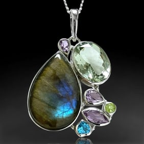 Magnificent Multi-Gemstone Pendant with an arrary colors wrapped in Sterling Silver