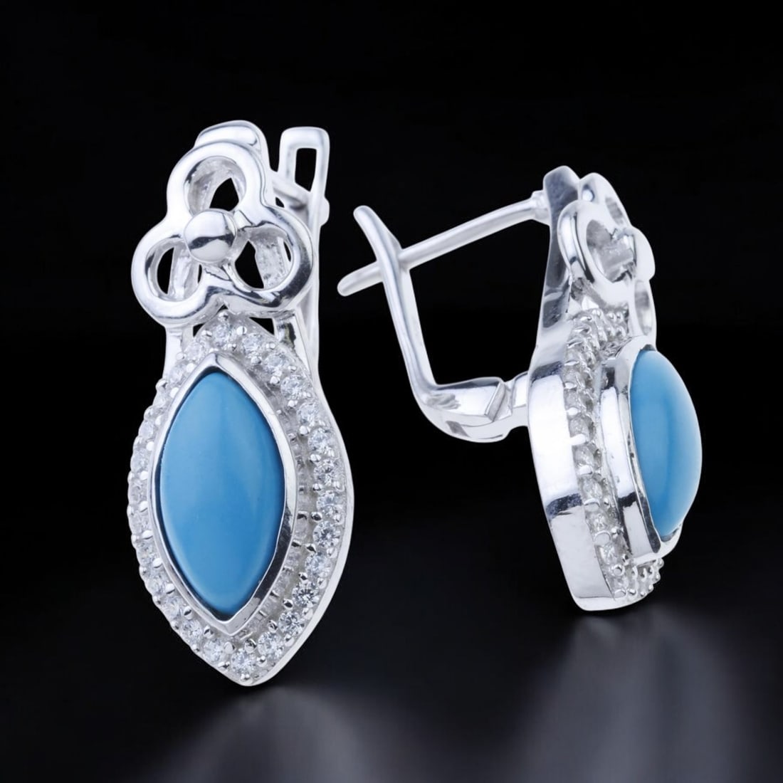 Heavenly Blue Turquoise Leverback Earrings: Product Details Item: Earrings Metal: Unknown Gemstone: Marquise Synthetic Blue Turquoise & White Zircon Approximate Measurements: 27.8 mm X 11 mm Ring Size: Not Applicable Chain Length: Not