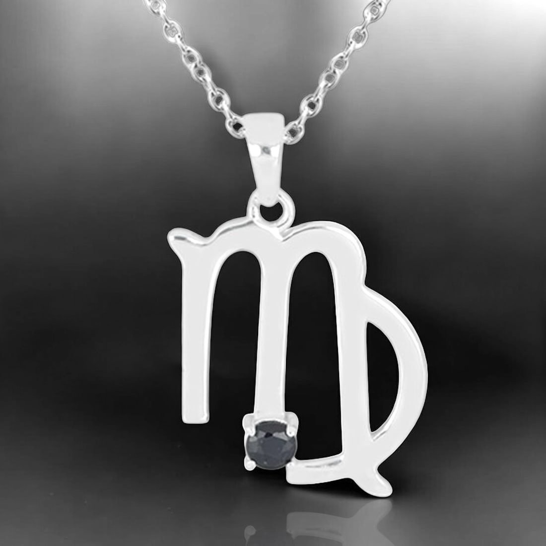 0.35 Ct Blue Sapphire Virgo Zodiac Sterling Silver Pendant with 18" Sterling Silver Chain: Product Details Item: Pendant Metal: Sterling Silver Gemstone: 0.35ct Blue Sapphire Approximate Measurements: 29.3 mm X 18.3 mm Ring Size: Not Applicable Chain Length: 18" Chain Metal: