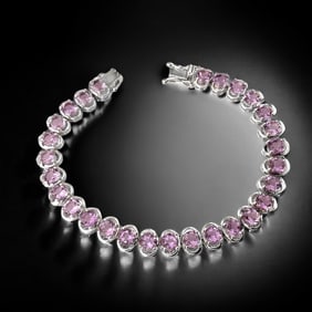 28 exquisite Amethyst Gemstones set on this 7.25" Sterling Silver Bracelet