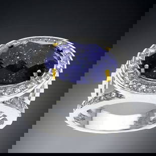 Oval checkerboard Lapis Sterling Silver Ring with 14K gold accents and dazzling White Topaz accents: Lapis: One oval checkerboard cut 14 mm X 10 mm White Topaz: Various round modified-brilliant cut 1.5 mm Product Details Item: Ring Metal: Sterling Silver Gemstone: Lapis & White Topaz 