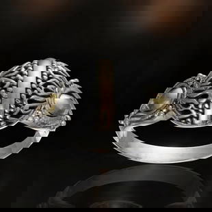 14K Gold & Sterling Silver Ring with Intricate Filagree design - Size 6: Product Details Item: Ring Metal: 14K Gold & Sterling Silver Gemstone: None Approximate Measurements: Width: 9.8 mm Ring Size: 6 Chain Length: Not Applicable Chain Metal: Not Applicable NO