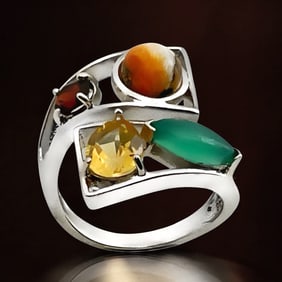 An array of stunning Gemstones set in a Sterling Silver Bypass Ring - Size 7