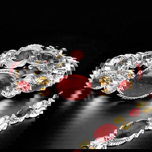 Red Coral Sterling Silver Bracelet with Citrine accents: Red Coral: Various oval 16 mm X 12mm, oval 14 mm X 10mm, oval 11 mm X 9 mm and oval 7 mm X 5 mm cabochons Citrine: 16 oval cut 6 mm X 4 mm Product Details Item: Bracelet Metal: Sterling Silver Gemston