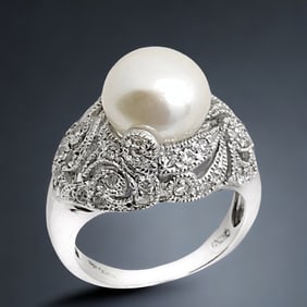 Timeless Sterling Silver Ring with a Pearl centerstone and an array of Simulated Diamonds - Size 7