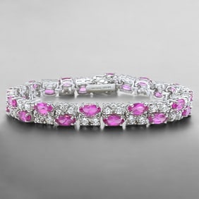 Regal Sterling Silver Bracelet adorned with Simulated Diamonds and Deep Pink accents