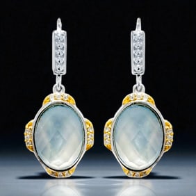 An enchanting combination of Blue Mother of Pearl & White Topaz Sterling Silver Earrings