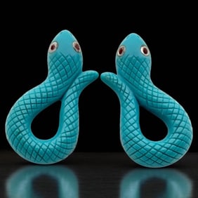 Whimisical Turquoise Snake Earrings with sparkling Garnet eyes!