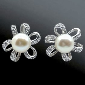 Elegant Pearl Sterling Silver Earrings adorned with sparking Simulated Diamonds