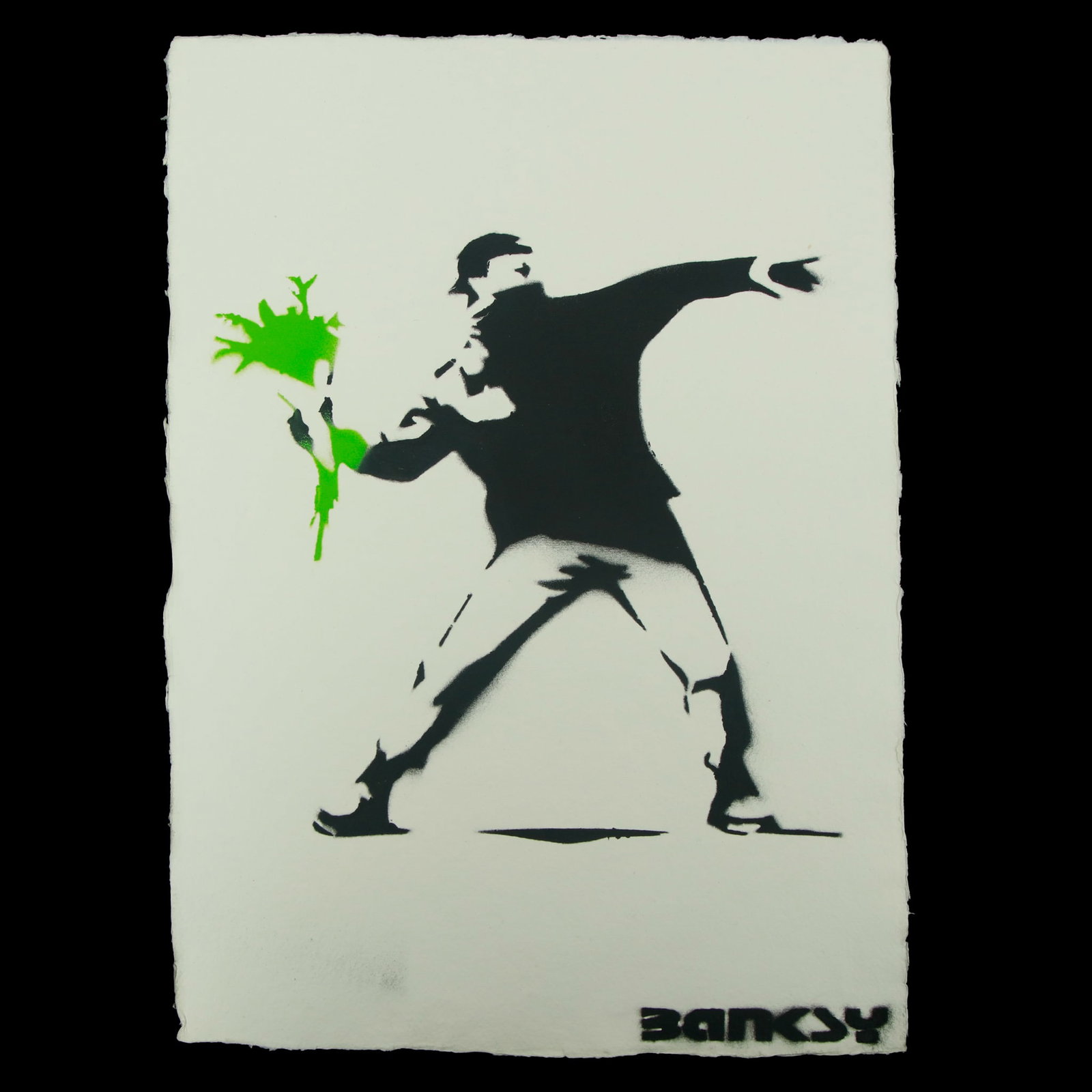 Banksy, “Love Is In The Air (Flower Thrower)”: Title: Banksy – “Love Is In The Air (Flower Thrower)” Medium: Pigment print on heavy handmade Japanese paper with deckle edge Image: Black and off-white, figure with green flowers Si