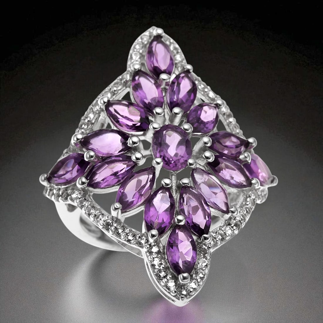 Enchanting Amethyst & White Topaz Sterling Silver Ring - Size 7: Product Details Item: Ring Metal: Sterling Silver Gemstone: Amethyst & White Topaz Approximate Measurements: Width: 32 mm Ring Size: 7 Chain Length: Not Applicable Chain Metal: Not Ap