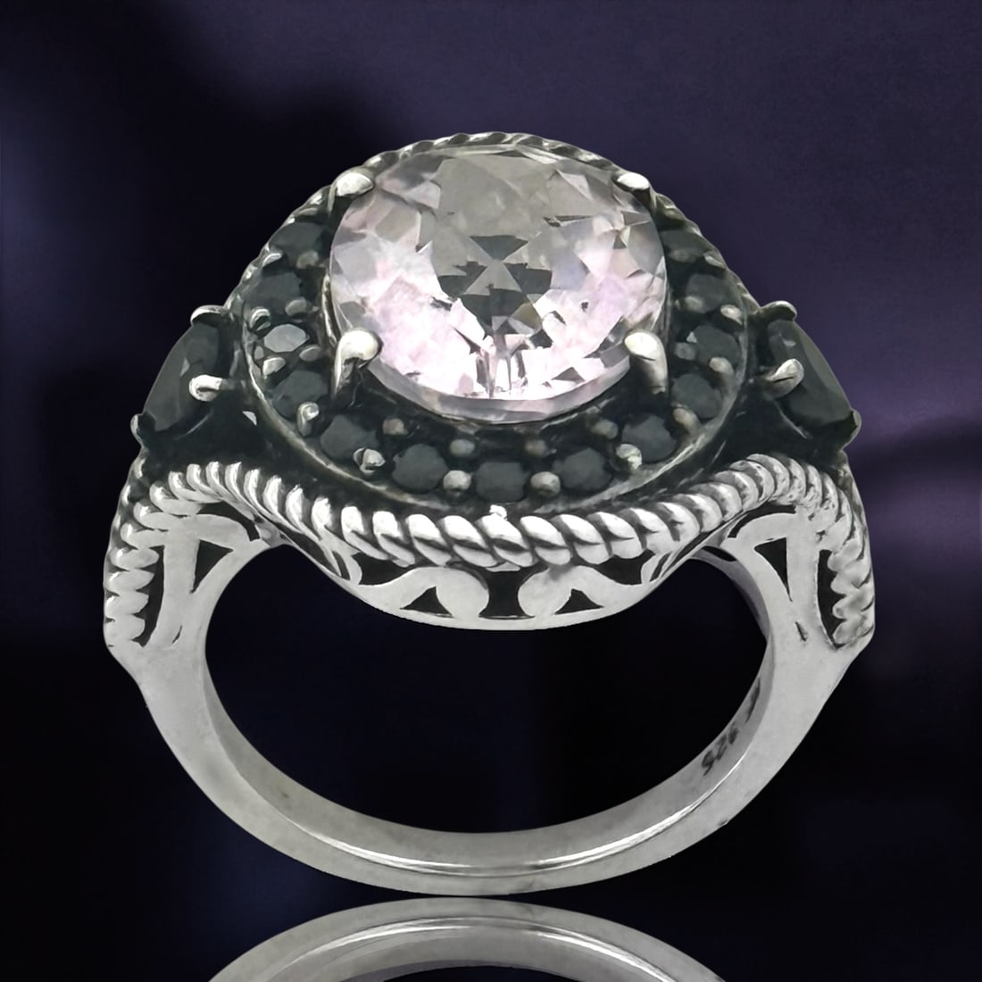 Pink Amethyst & Black Spinel Halo Sterling Silver Ring - Size 7.25: Product Details Item: Ring Metal: Sterling Silver Gemstone: Pink Amethyst & Black Spinel Approximate Measurements: Width: 19 mm Ring Size: 7.25 Chain Length: Not Applicable Chain Metal: