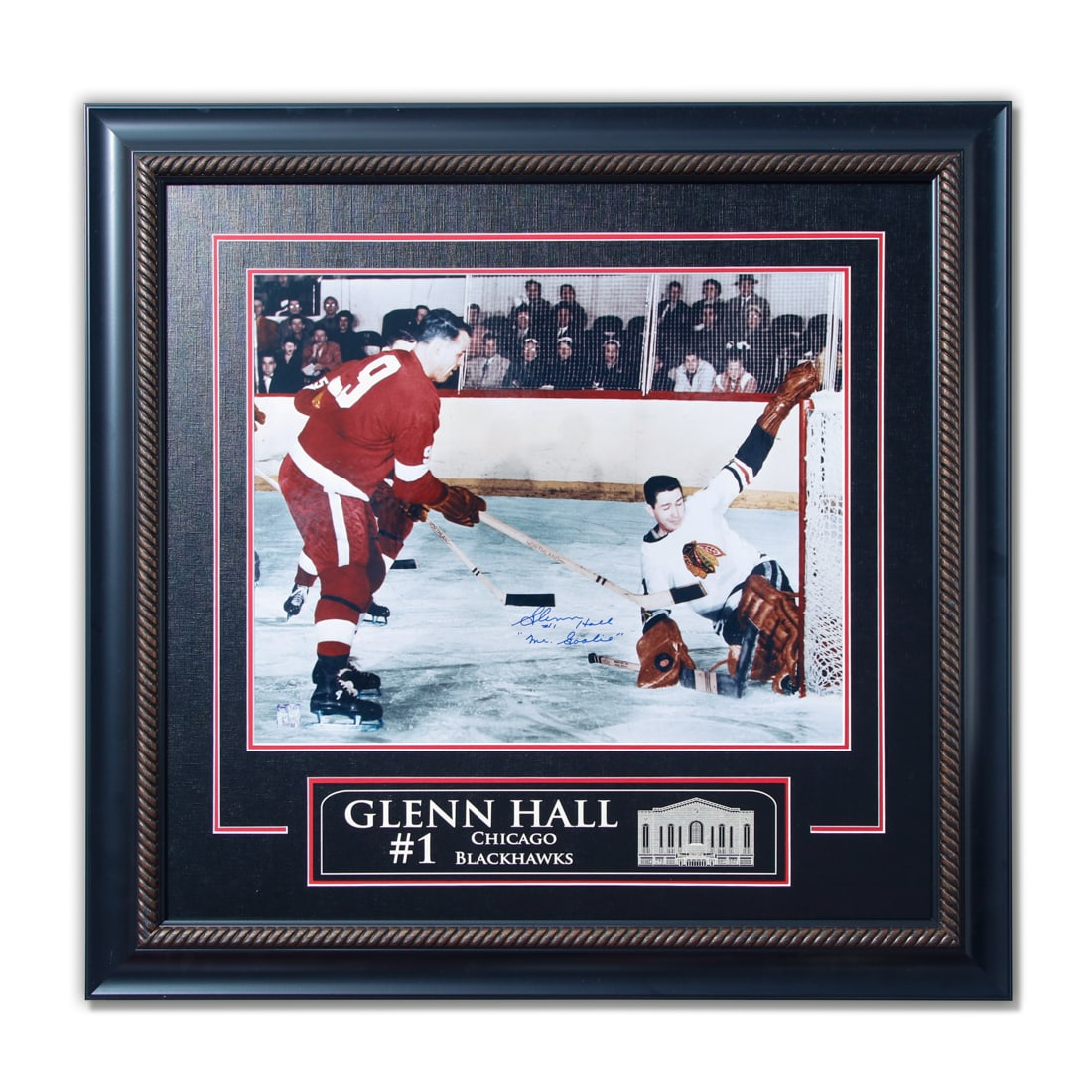 Glenn Hall Signed 16"x20" Chicago Blackhawks Photo – Framed 31"x30" Display: Up for auction is an impressive framed 16"x20" color photograph personally autographed by legendary goaltender Glenn Hall of the Chicago Blackhawks. Known as “Mr. Goalie,” Hall is captured