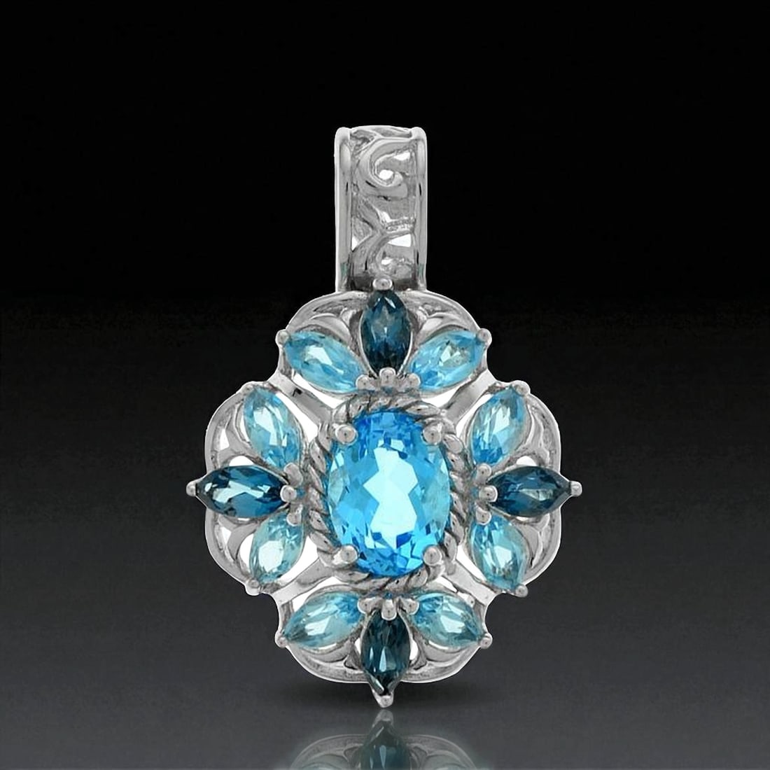 3.14 Cttw Shades of Blue Floral Motif Blue Topaz Silver Pendant: Swiss Blue Topaz: One oval cut 8 mm X 6 mm and eight marquise cut 5 mm X 2.5 mm London Blue Topaz: Four marquise cut 5 mm X 2.5mm Product Details Item: Pendant Metal: Sterling Silver Gemstone: Swiss B