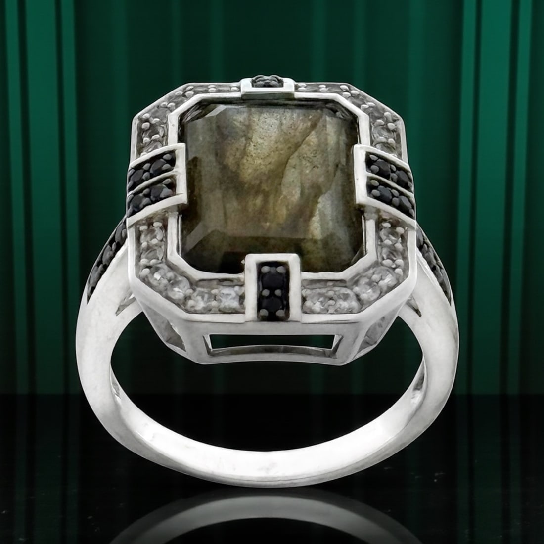 Art Deco Labradorite Sterling Silver Ring SZ 8: Product Details Item: Ring Metal: Sterling Silver Gemstone: Labradorite, Black Spinel, & White Topaz Approximate Measurements: Width: 19.3 mm Ring Size: 8 Chain Length: Not Applicable Cha