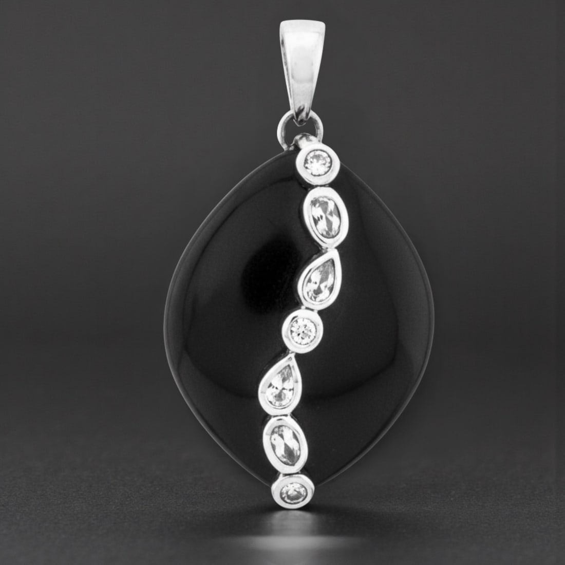 Marquise Shape Design Colorado Black Moon Jade Sterling Silver Pendant: Product Details Item: Pendant Metal: Sterling Silver Gemstone: Colorado Black Moon Jade Approximate Measurements: Width: 54 mm X 30.7 mm Ring Size: Not Applicable Chain Length: Not Applicable