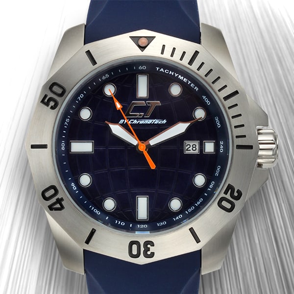 Chronotech Sport Diver-Style Watch: This Chronotech sport watch delivers a bold, modern look inspired by classic diver styling. The robust stainless steel case is paired with a brushed steel bezel and a deep blue textured dial, accented