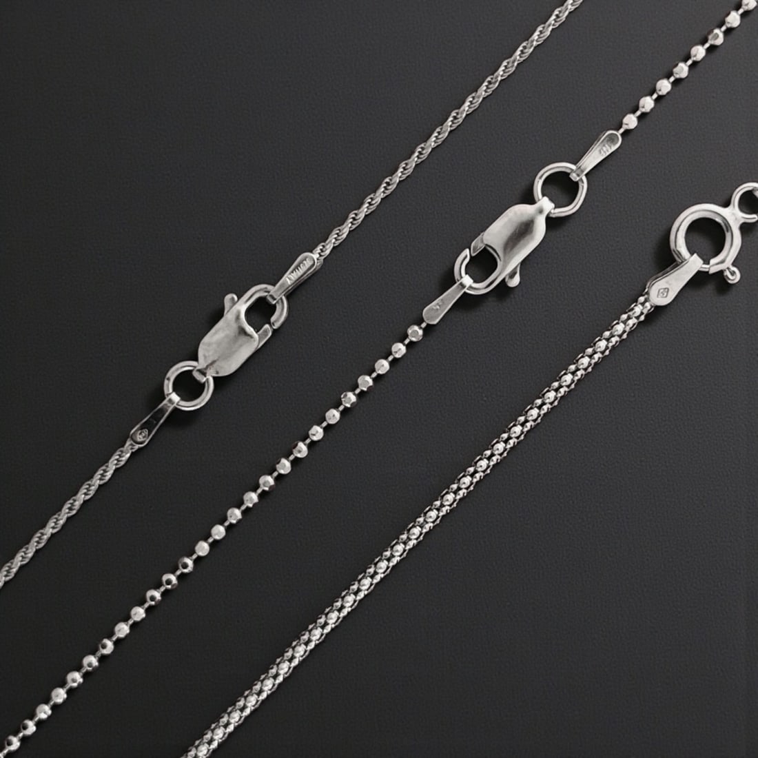(3) Sterling Silver Chains (Rope, Popcorn, & Diamondcut Bead): Product Details Item: Necklace Metal: Sterling Silver Gemstone: None Approximate Measurements: Ring Size: Not Applicable Chain Length: 18" Chain Metal: Sterling Silver NO RETURNS NO