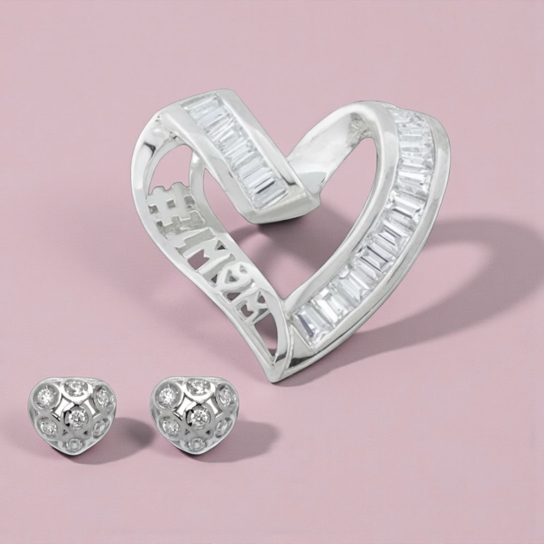 Sterling Silver '#1 Mom'Heart Pendant and Earrings Set: Product Details Item: Earrings & Pendant Metal: Sterling Silver Gemstone: White CZ Approximate Measurements: E:6.8X8 mm/P:19.6X22.6 mm Ring Size: Not Applicable Chain Length: Not Applicable 