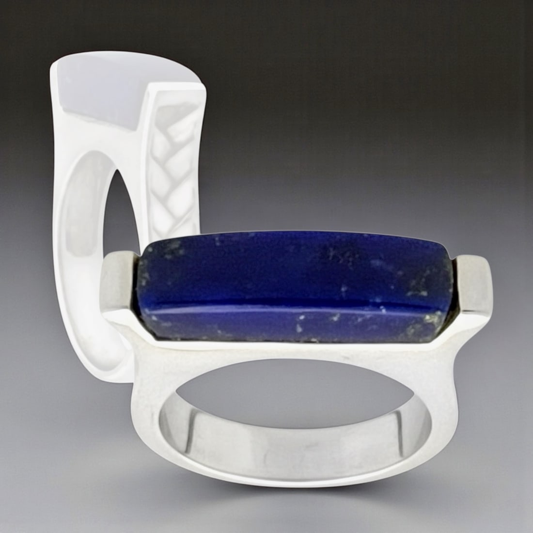 Blue Lapis Lazuli Rectangular Bar Sterling Silver Ring SZ 7: Product Details Item: Ring Metal: Sterling Silver Gemstone: Blue Lapis Lazuli Approximate Measurements: Width: 5.6 mm Ring Size: 7 Chain Length: Not Applicable Chain Metal: Not Applicable<