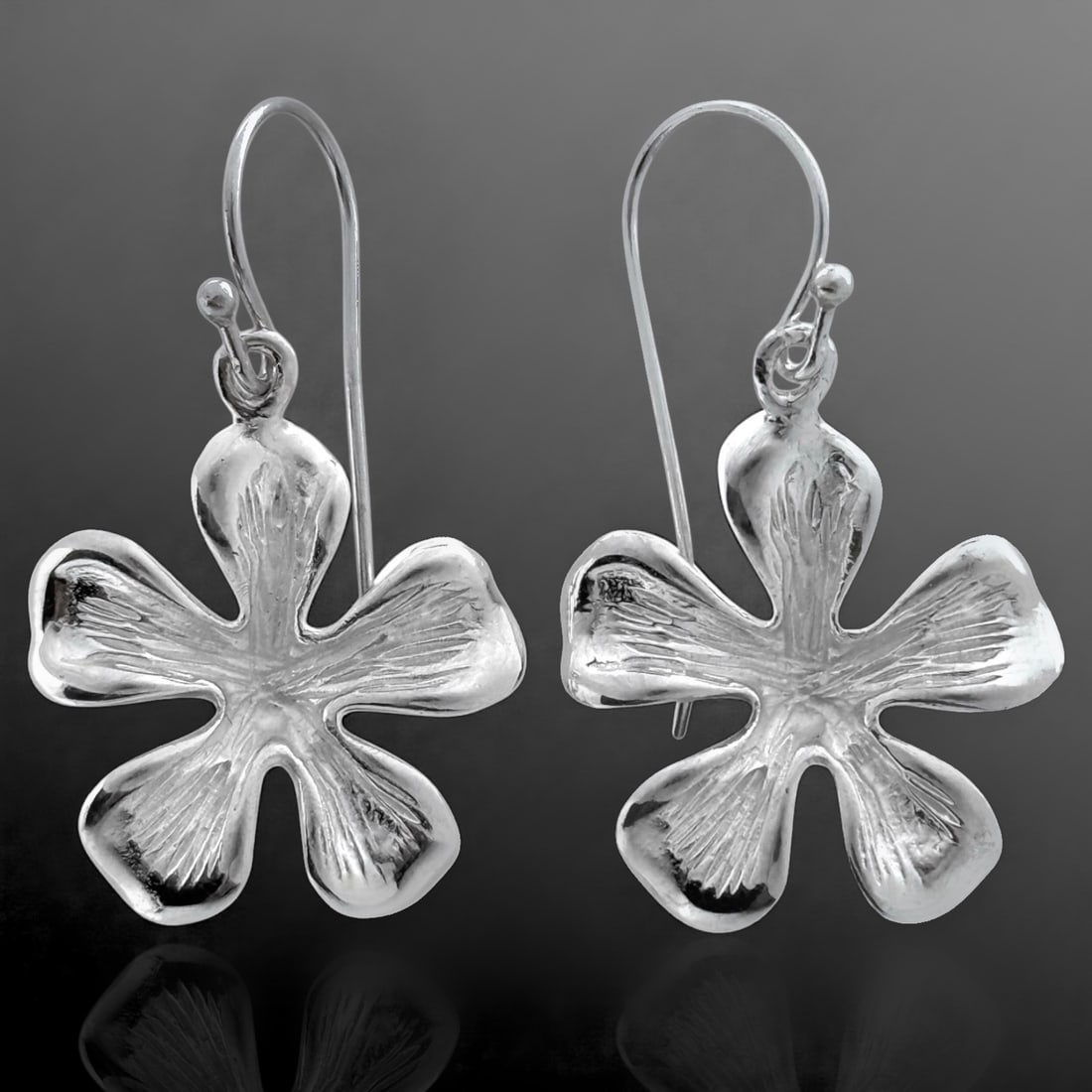 Nature Inspired Plumeria Flower Sterling Silver Dangle Earrings: Product Details Item: Earrings Metal: Sterling Silver Gemstone: NONE Approximate Measurements: 38.3 mm X 21.7 mm Ring Size: Not Applicable Chain Length: Not Applicable Chain Metal: Not Appli